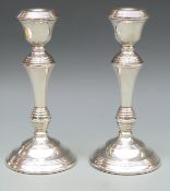 A pair of hallmarked silver candlesticks, Birmingham 1972 maker W I Broadway & Co,
