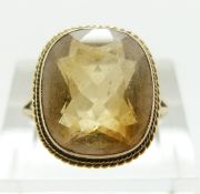 A 9ct gold ring set with a citrine, size O/P, 3.