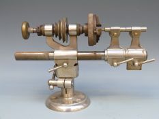 A nickel plated watchmakers, or similar, bench lathe with Burnerd chuck,