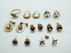 A collection of 9ct gold earring including a pair set with a zircon, a pair set with amethysts,