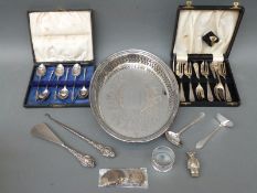 A hallmarked silver handled button hook and shoe horn, coins, cased plated cutlery,