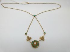 An Edwardian necklace set with seed pearls and turquoise in a floral design