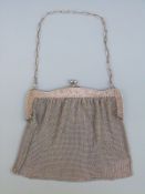 A white metal or similar mesh bag, no visible marks,