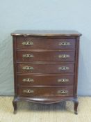 A small chest of five drawers,