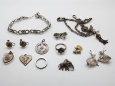 A collection of silver jewellery to include bracelet set with marcasite, ring,