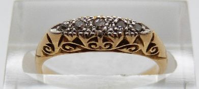 An 18ct gold four stone diamond ring, size K, 2.