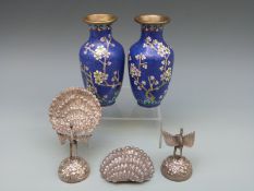 A pair of cloisonne vases and a pair of Indian white metal menu holders in the form of peacocks,