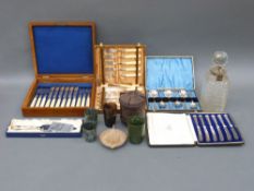 A cased set of hallmarked silver handled knives, plated lockable decanter,
