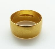 A 22ct gold wedding band, 10.