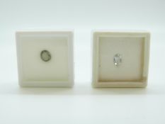 An oval cut sapphire and an oval cut aquamarine