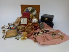 A collection of costume jewellery to include compacts, chains, Fabergé box,