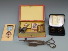 A collection of items including silver belt buckle, Chester 1909, 1927 Cheltenham medal,