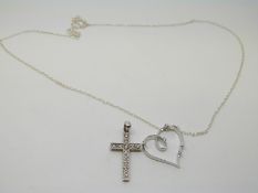 A 9ct white gold heart pendant and 9ct gold cross pendant both set with diamonds