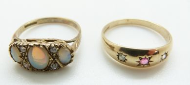 A 9ct gold ring set with opals and a 9ct gold ring set with a ruby and diamonds, sizes M and P, 4.