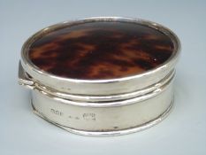 A George V Asprey hallmarked silver and tortoiseshell dressing table pot, London 1923,