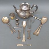 A hallmarked silver lidded dressing table pot, plated teapot, cutlery,