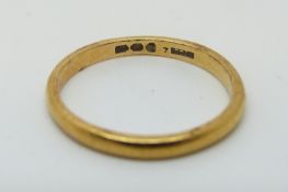 A 22ct gold wedding band, 2.