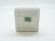An emerald cut emerald