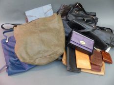 A group of handbags and purses to include Italian leather etc