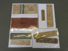 Eight 19thC Japan Hanatsu Feudal banknotes