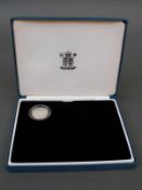 A cased £1 Piedfort coin for 2000 millennium year,