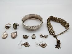 A hallmarked silver bangle with engraved decoration (Birmingham 1902) Wedgwood ring,