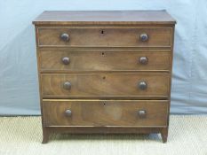 A 19thC mahogany chest of four graduated drawers with cockspur detail,