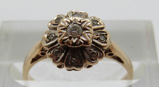A 9ct gold ring set with diamonds, size J, 2.