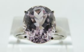 A 14ct white gold ring set with a pink topaz, size O/P, 4.