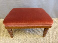 A late 19thC/early 20thC footstool with turned legs