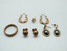 A 9ct gold ring and 9ct gold earrings including a pair in the form of dolphins and a pair set with