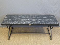 A marble topped coffee table