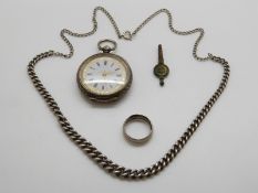 A silver fob watch,