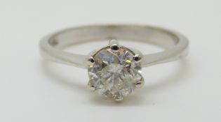 An 18ct white gold ring set with a diamond of approximately 0.
