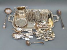 A collection of plated ware including a large twin handled tray with gadrooned edge,