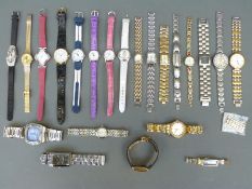 Twenty-two various modern wristwatches including Fossil, Sekonda, Vialli,