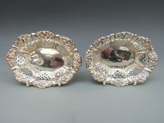 A pair of Victorian hallmarked silver pierced bon bon dishes,