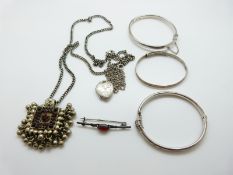A Charles Horner silver bangle, Charles Horner silver christening bangle, silver locket and chain,
