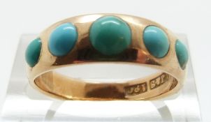 An 18ct gold Victorian ring set with five turquoise cabochons, size N/O, 4.