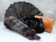 A vintage crocodile skin handbag, moleskin muff / bag,