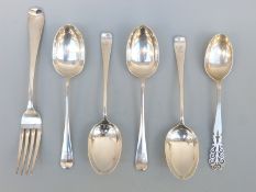 Four hallmarked silver Hanoverian rat tail pattern dessert spoons,