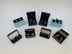 A collection of cufflinks including Hawes & Curtis, enamel examples, chequered mother of pearl,
