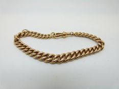 A 15ct gold graduated curb link bracelet,