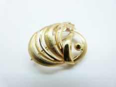 A 14ct gold brooch in a stylised foliate design, 6.