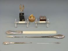 A hallmarked silver handled page turner with ivory blade, silver handled button hook,