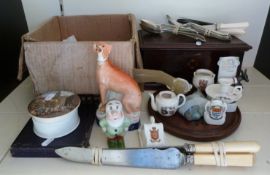 A Prattware pot and lid, crested ware, Staffordshire greyhound, donkey barometer fairing,