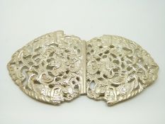 A hallmarked silver buckle relief decorated with mermaid putti, Birmingham 1901, weight 60g, 6.