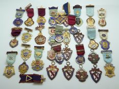 A large quantity of enamel Masonic medals / jewels,