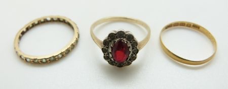 An 18ct gold wedding band (1g), a 9ct gold ring and another 9ct gold and silver ring, 3.