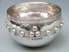 An Edward VII hallmarked silver model of the Glastonbury iron age bowl,